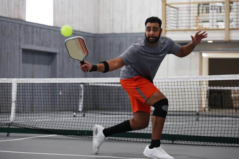 a person playing pickleball
