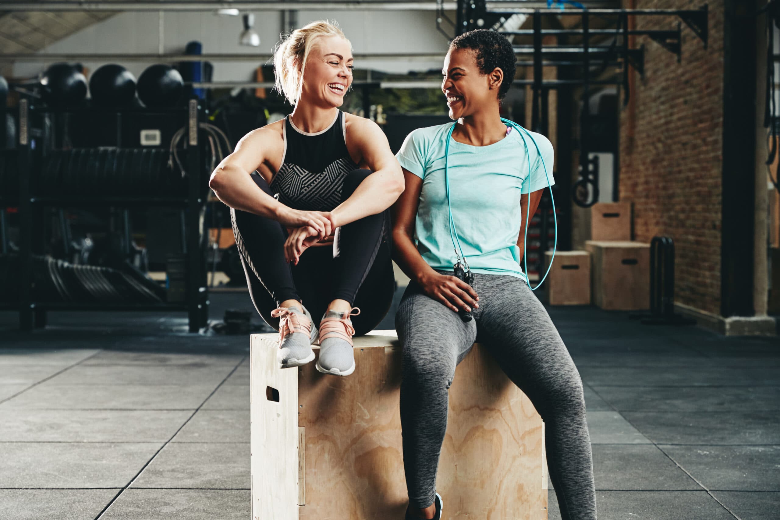 gym buddies at the fitness center taking a break