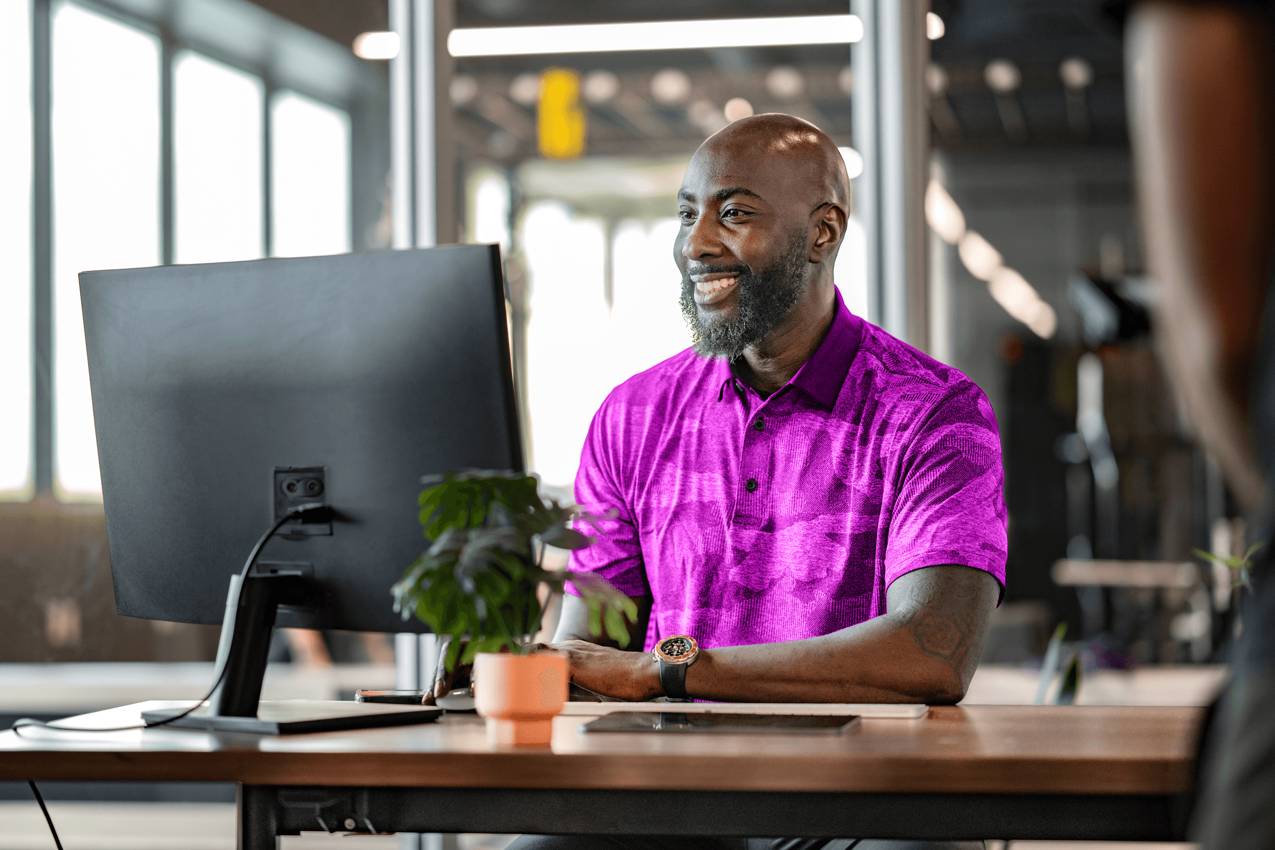 Fitness franchise owner analyzing growth metrics with Club Automation’s management software