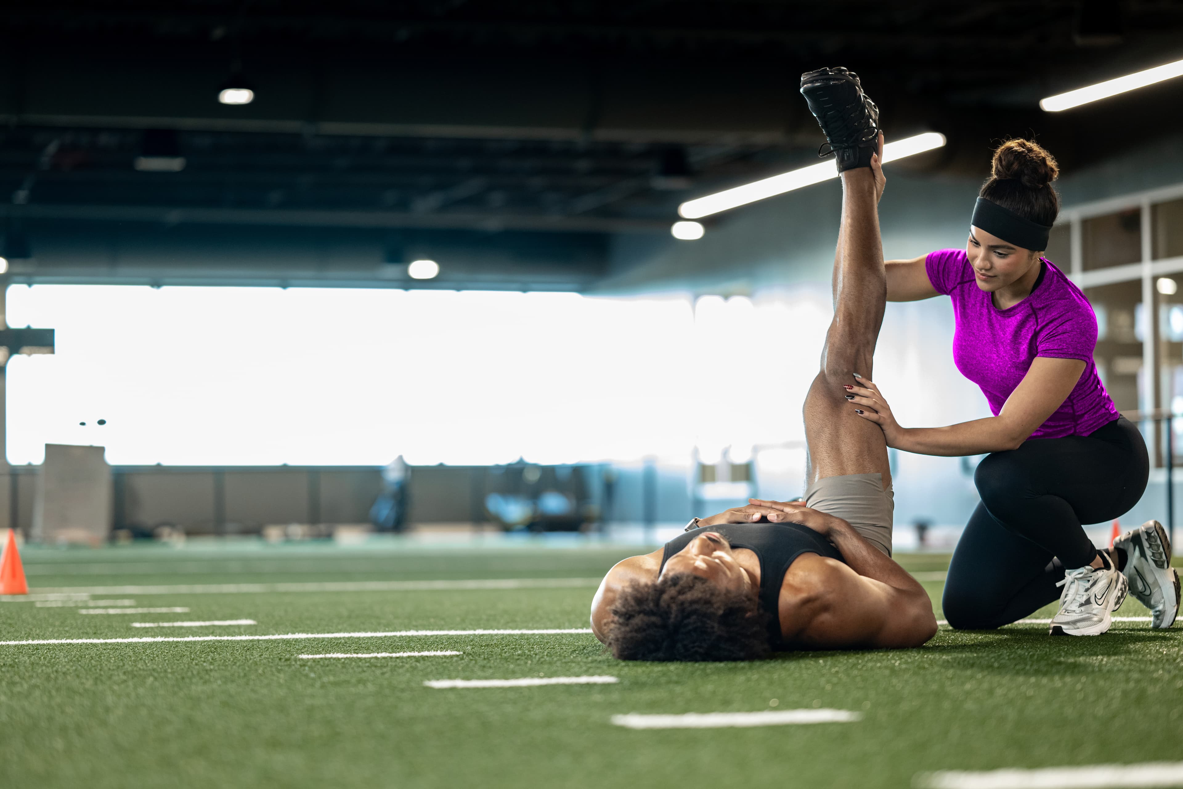 A fitness member performing physical activities at a gym