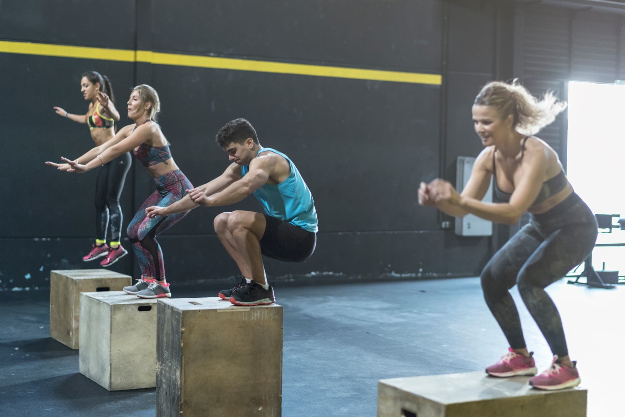 Family members checking in at a fitness club using shared membership software