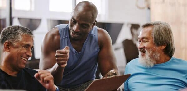 people discussing at a fitness cub