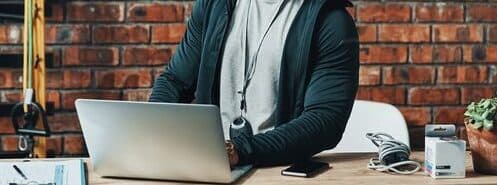 a person checking out the software on a laptop