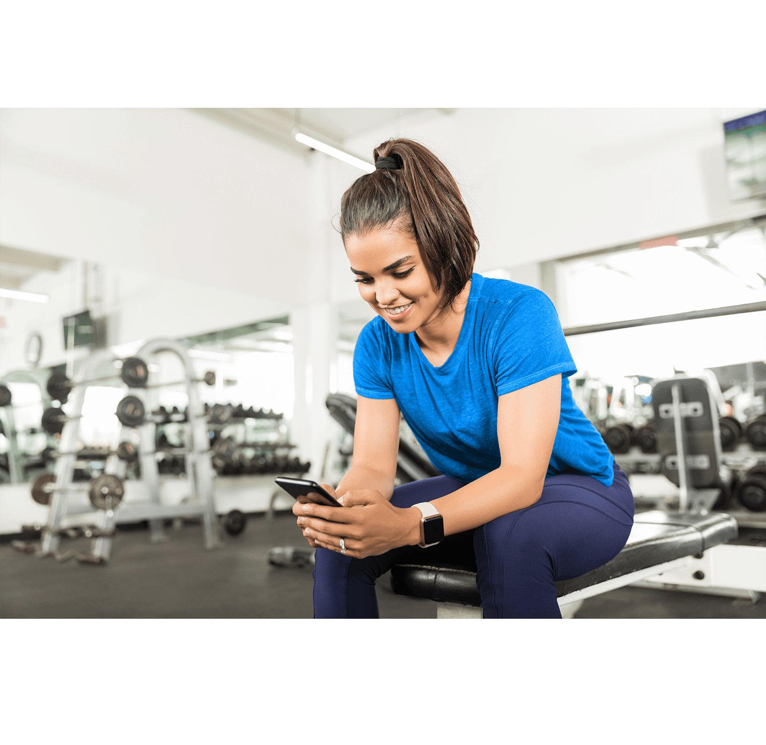Fitness club member referring a friend using a mobile loyalty rewards app powered by Daxko Club Automation and Perkville.