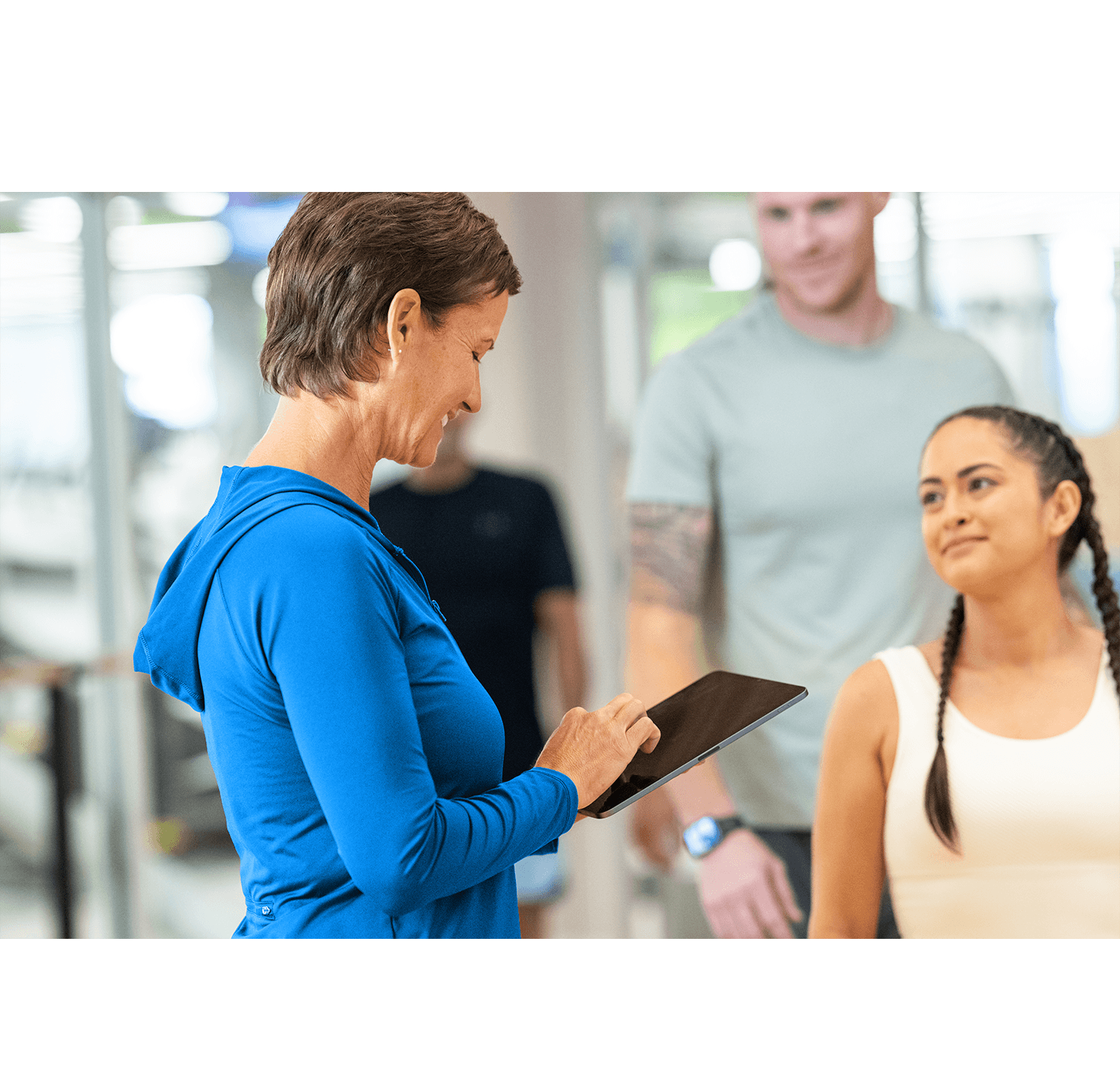Fitness club owner reviewing payment processing costs report with Flex Fees revenue offset analysis